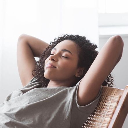 Image of a woman relaxing during an online session