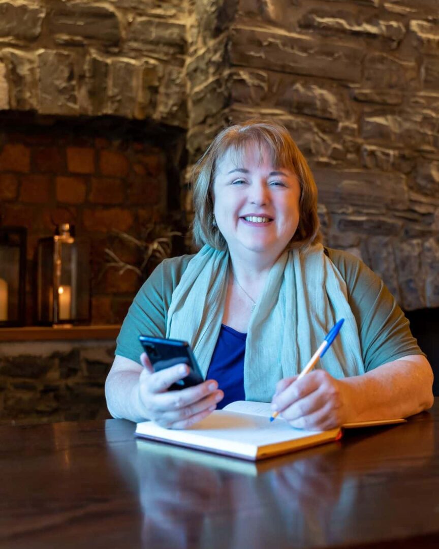 Jackie McGloughlin holistic therapist smiling.